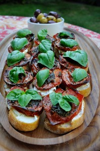 Wooden Platter with Roasted tomato Goat Cheese Crostini