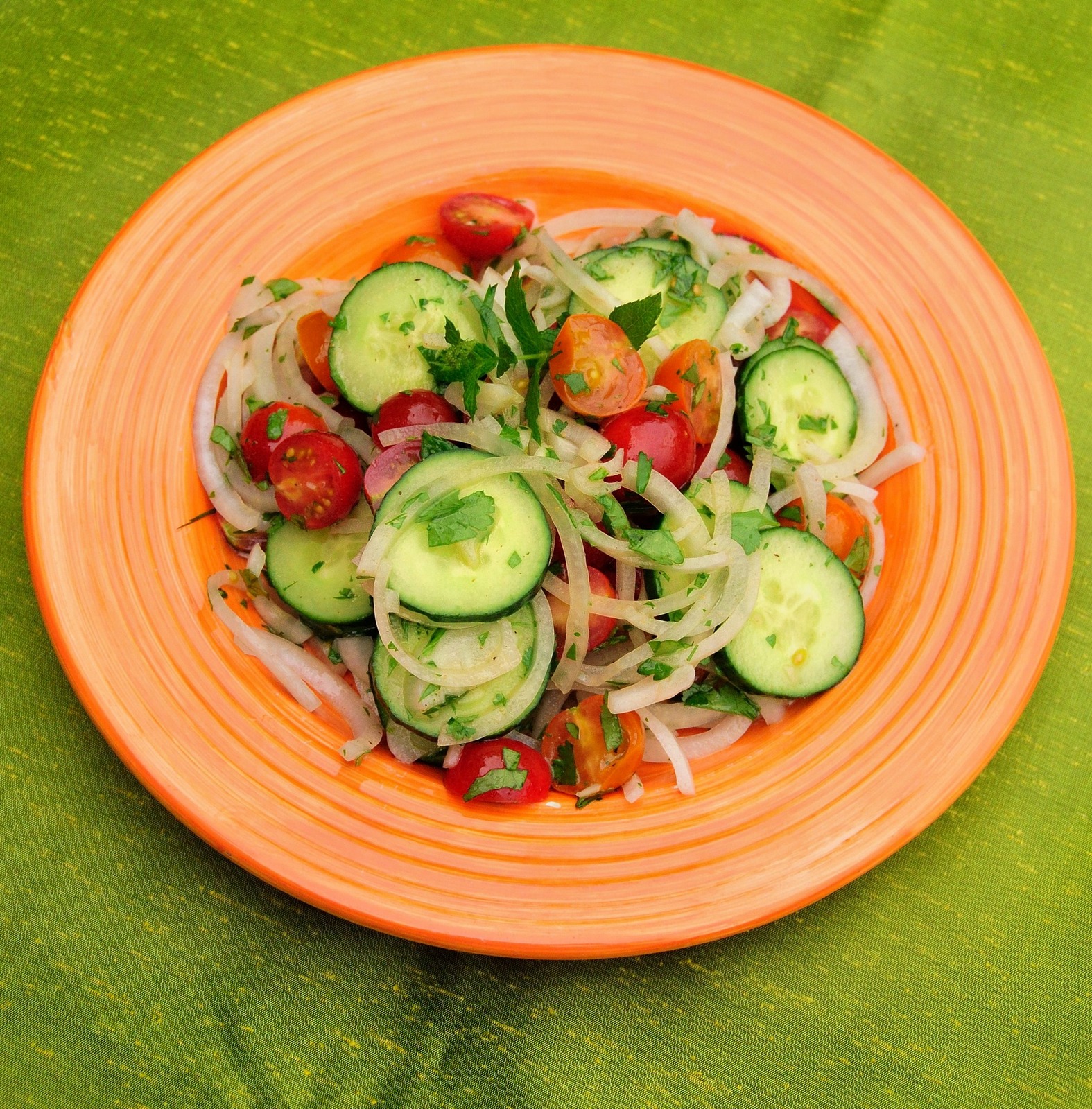 Kachcomber Salad (Indian Tomato Cucumber Salad) Orange Plate