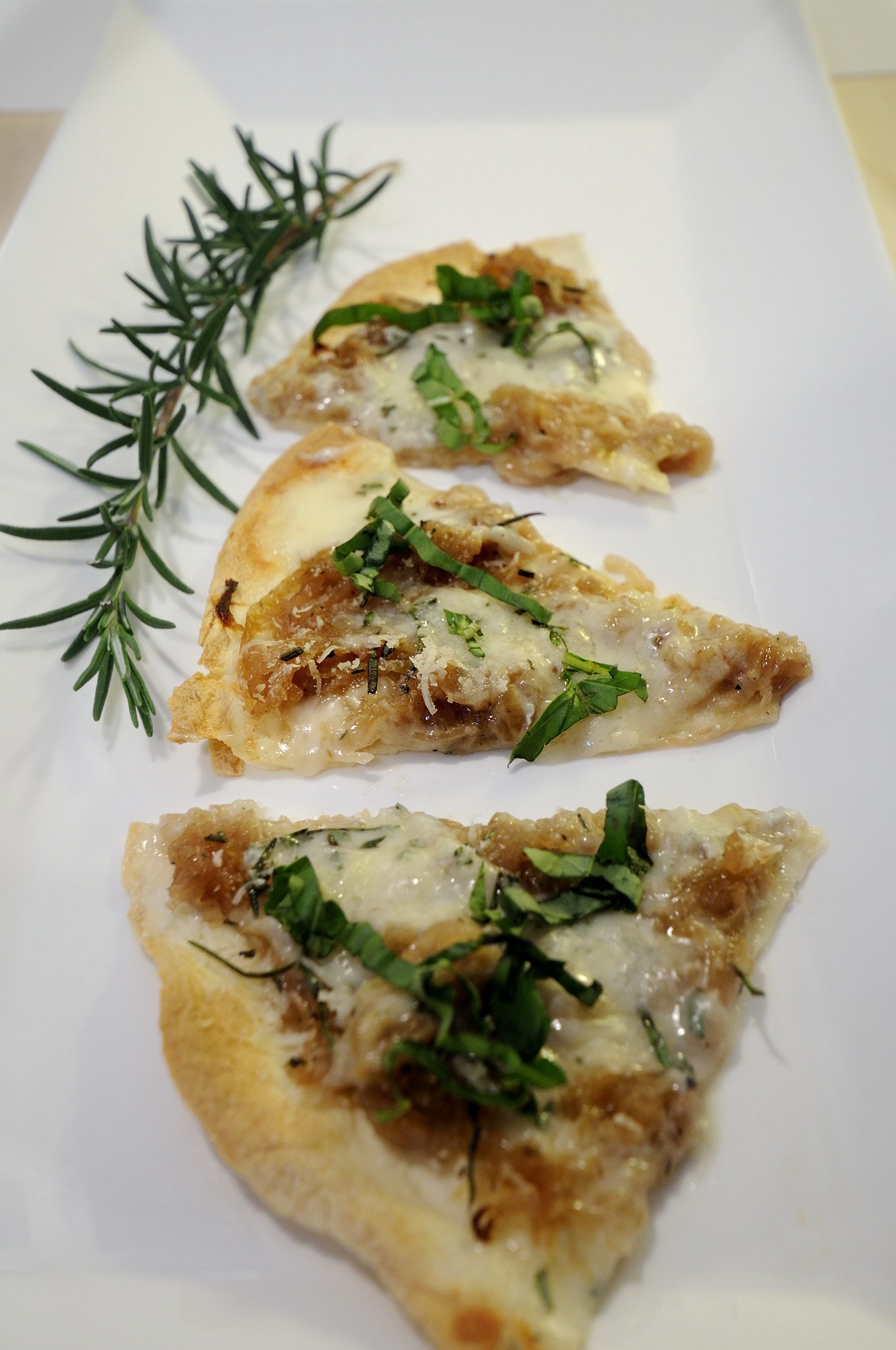 "Pizza" with Caramelized Onions & Gorgonzola, Rosemary Garnish