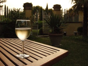 Blog Post Photo, Tuscany, White Wine on Wooden Outdoor Table, Photo also used in What Wine?